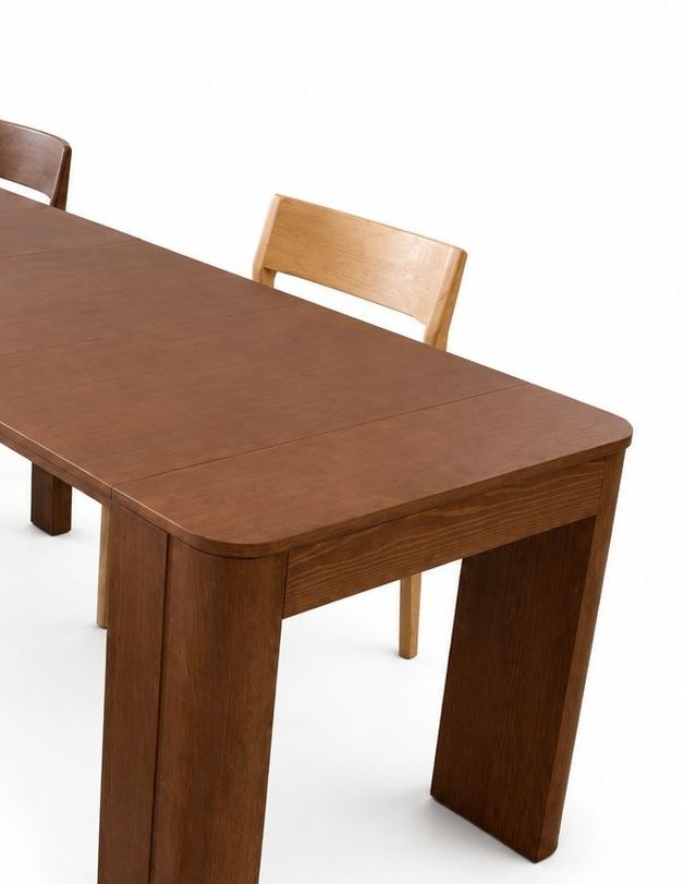 Close detail of the Dark Oak wood grain finish on the EXTENDR table